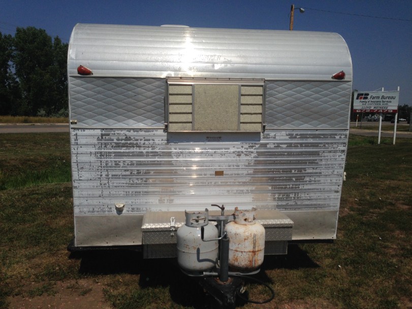 That truck box has no business on my vintage travel trailer. Every time it was opened, it scraped along Myrtle's aluminum skin...