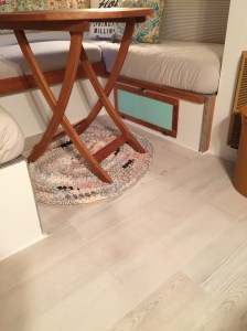 Beautiful new vinyl plank flooring with the look of weathered beach wood